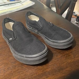Kids black slip on Vans